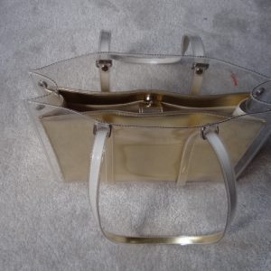 Handbag Gold colour with clear outer cover