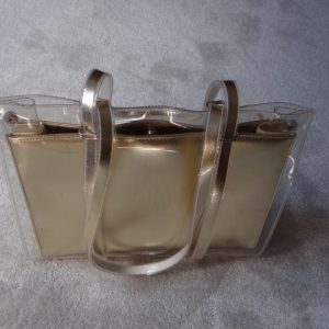 Handbag Gold colour with clear outer cover